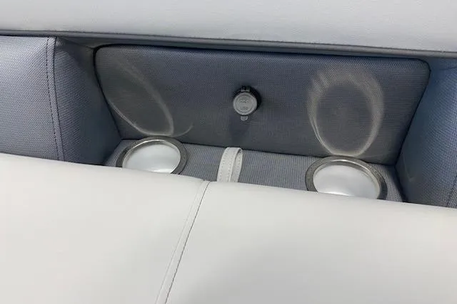 Slide: The Image of 2026 Bentley Pontoons Legacy 243 Navigator interior with cup holders and USB port. - 8