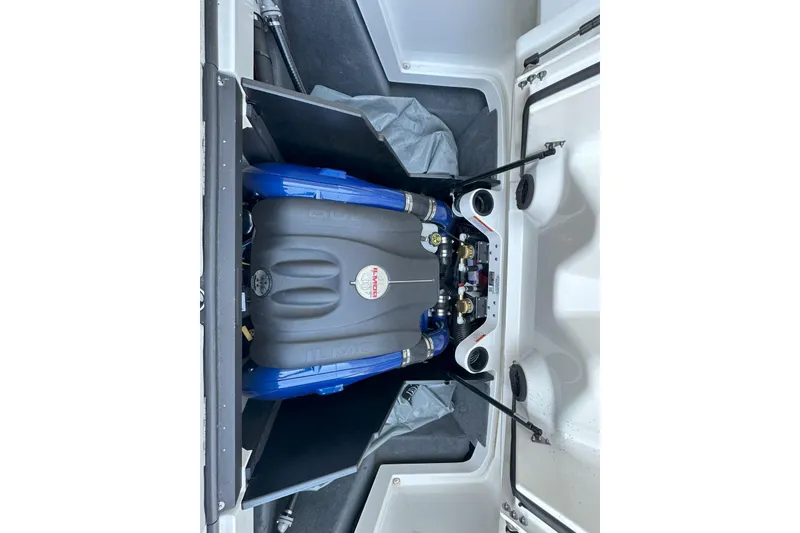 Slide: The Image of Engine compartment of a 2017 MasterCraft X23 boat, featuring an Ilmor engine. - 10
