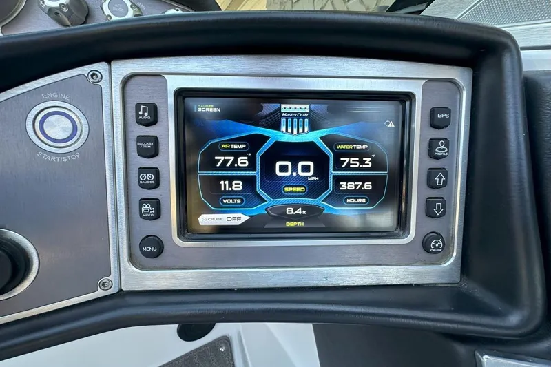 Slide: The Image of 2017 MasterCraft X23 dashboard display showing temperature, speed, and other boat metrics. - 11