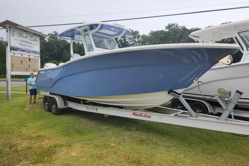 Slide: The Image of 2026 Sea Fox 288 Commander boat on trailer at Black Label Outdoors store. - 4