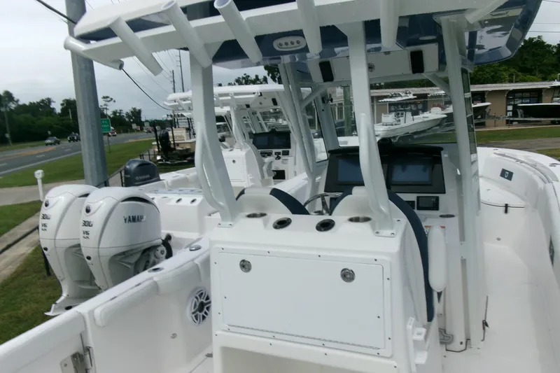 Slide: The Image of 2026 Sea Fox 288 Commander boat with dual Yamaha engines, featuring a modern helm and seating. - 6