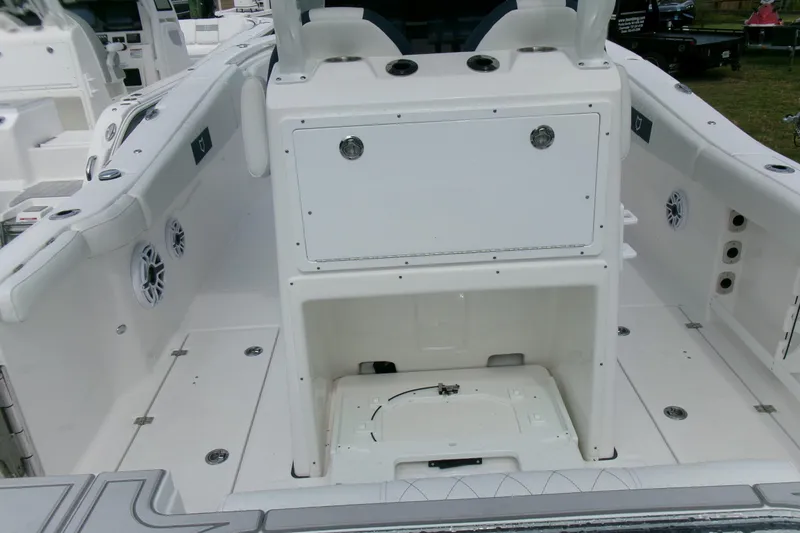Slide: The Image of 2026 Sea Fox 288 Commander boat interior, featuring spacious deck and storage compartments. - 8