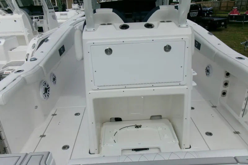 Slide: The Image of 2026 Sea Fox 288 Commander boat interior with storage compartments and seating. - 9