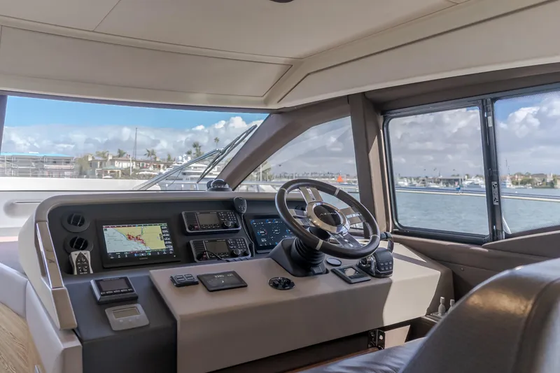 Slide: The Image of Cockpit of 2015 Azimut Fly 50 yacht with navigation equipment and steering wheel. - 19