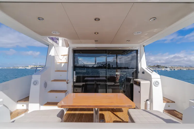 Slide: The Image of Luxurious 2015 Azimut Fly 50 yacht deck with ocean view and elegant seating area. - 39