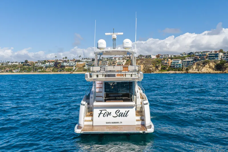 Slide: The Image of Azimut Fly 50 yacht, 2015 model, on ocean near coastal homes, Santa Barbara, CA. - 4