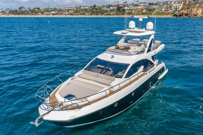 Slide: The Image of Luxurious 2015 Azimut Fly 50 yacht cruising on blue ocean waters near a scenic coastline. - 7