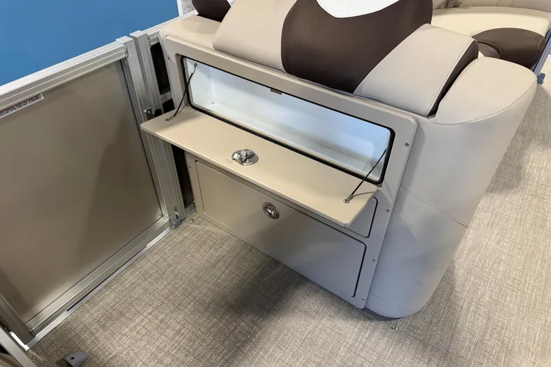 Slide: The Image of 2026 Avalon LSZ QL boat interior with storage compartment and seating. - 10