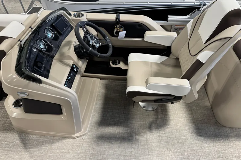 Slide: The Image of 2026 Avalon LSZ QL boat cockpit with modern steering and comfortable seating. - 11