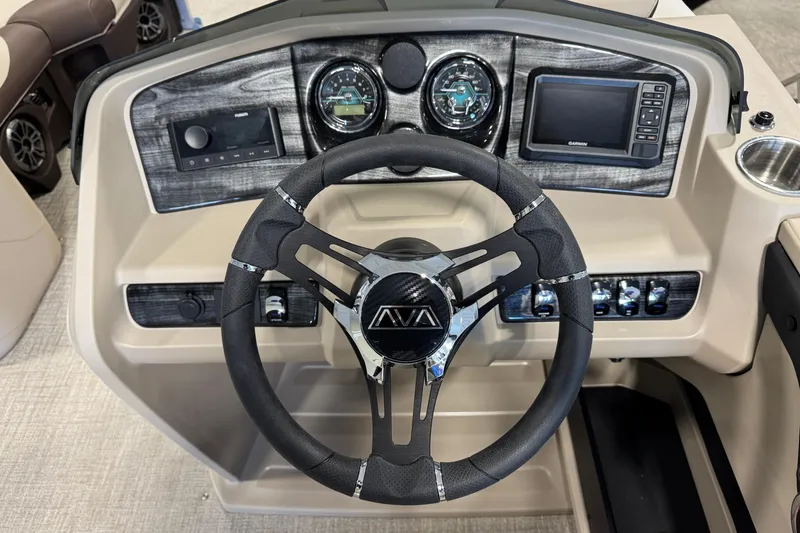 Slide: The Image of Steering console of 2026 Avalon LSZ QL boat with modern controls and gauges. - 12