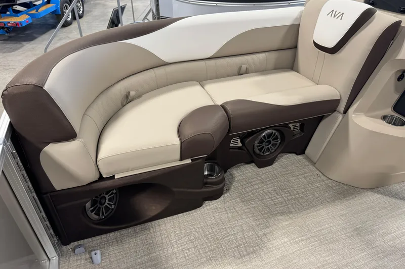 Slide: The Image of Luxurious seating in 2026 Avalon LSZ QL boat with integrated speakers and cup holders. - 5