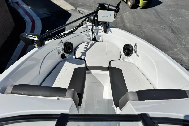 Slide: The Image of 2020 Tahoe 500 TF boat interior with Garmin equipment and seating. - 11