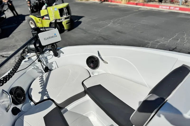 Slide: The Image of 2020 Tahoe 500 TF boat interior with Garmin device and seating. - 14