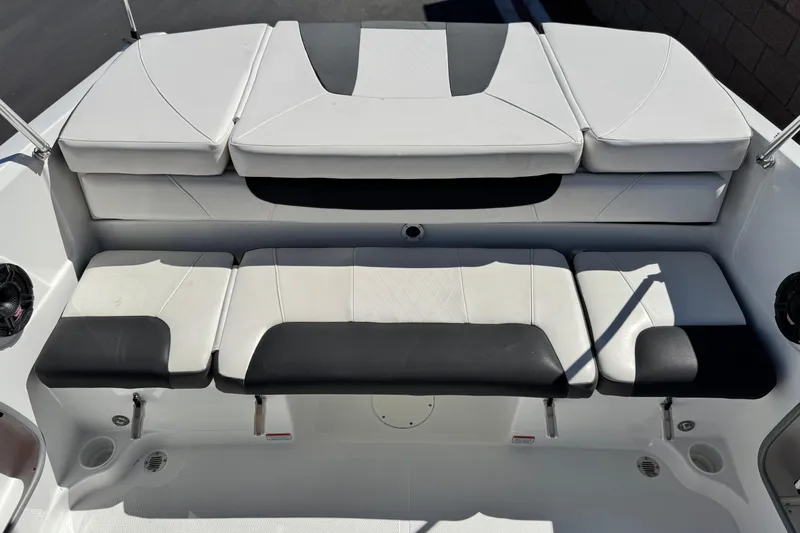 Slide: The Image of 2020 Tahoe 500 TF boat interior with white and black cushioned seating. - 17