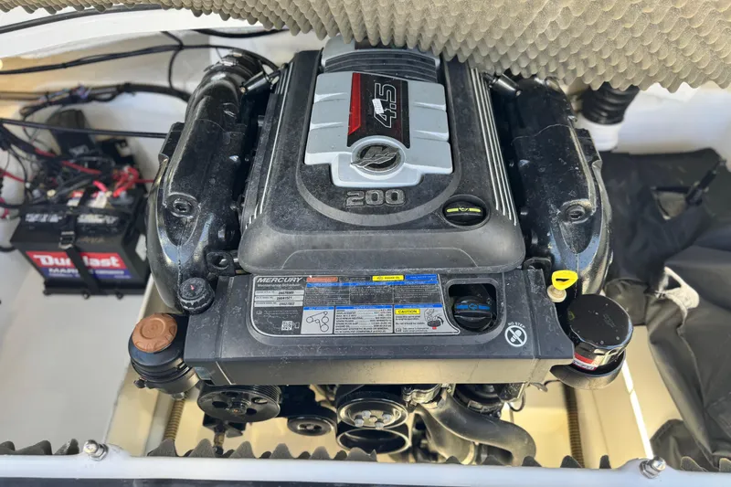 Slide: The Image of 2020 Tahoe 500 TF engine compartment with Mercury 4.5L 200 HP motor. - 19