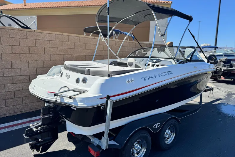 Slide: The Image of 2020 Tahoe 500 TF boat on trailer, featuring sleek design and modern amenities. - 5