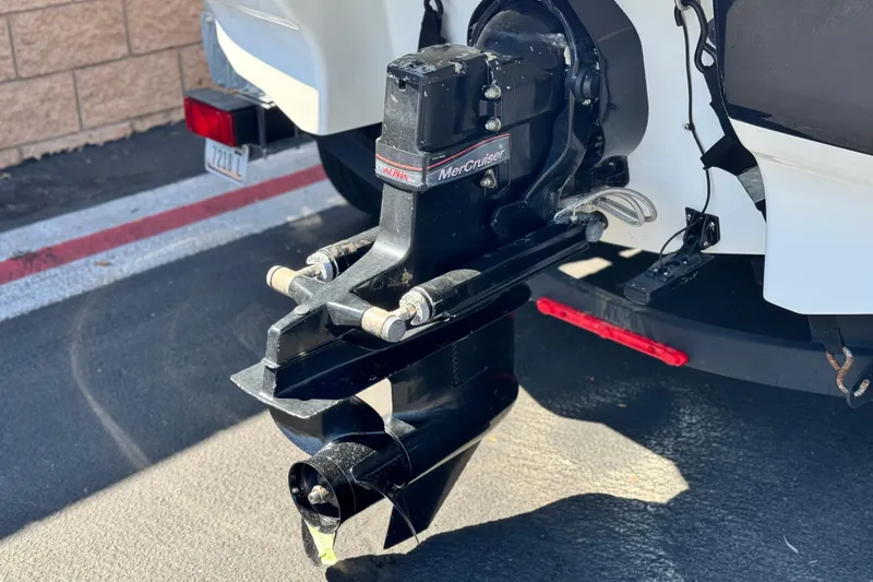 Slide: The Image of 2020 Tahoe 500 TF boat with MerCruiser outdrive in parking lot. - 6