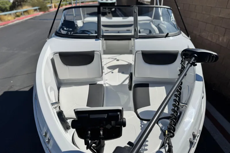 Slide: The Image of 2020 Tahoe 500 TF boat interior with seating and control panel. - 8