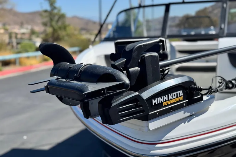 Slide: The Image of Minn Kota PowerDrive motor on 2020 Tahoe 500 TF boat, outdoor setting. - 9
