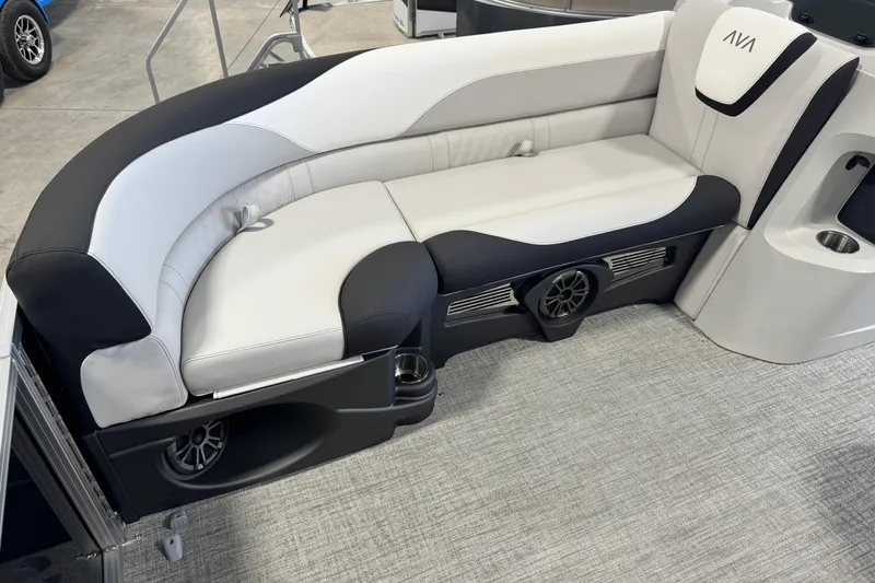 Slide: The Image of Luxurious seating in 2026 Avalon LSZ ELW boat with integrated speakers and cup holders. - 5