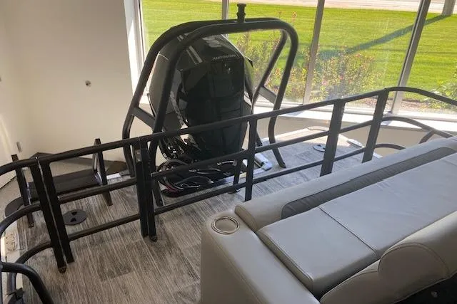 Slide: The Image of 2026 Bentley Pontoons Legacy 243 Swingback interior with seating and railing details. - 6