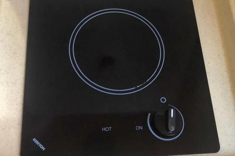 Slide: The Image of Kenyon stove control panel on 2005 Sea Ray 280 Sundancer boat. - 39