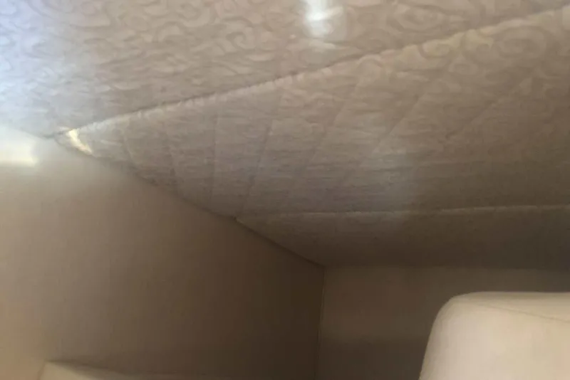 Slide: The Image of Interior cabin ceiling of 2005 Sea Ray 280 Sundancer boat. - 47
