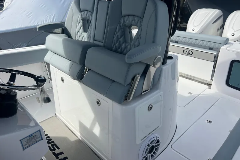 Slide: The Image of 2026 Sportsman Open 302 Center Console with luxurious seating and modern design. - 15