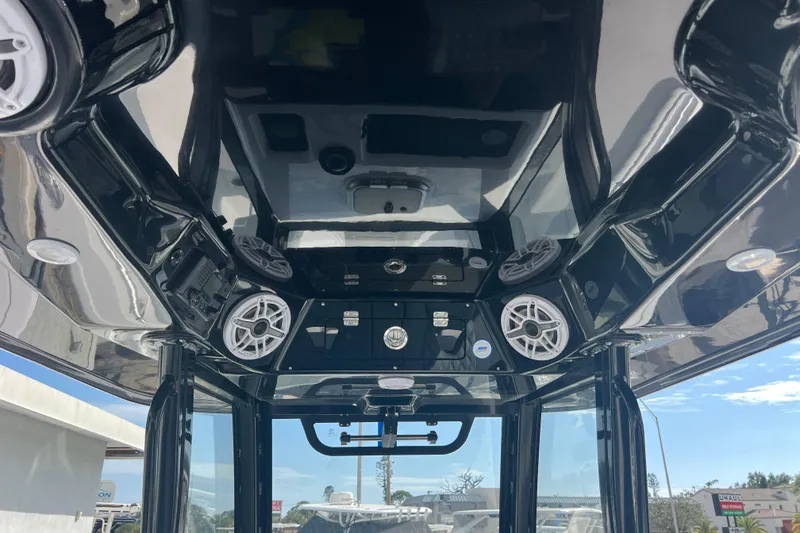 Slide: The Image of 2026 Sportsman Open 302 Center Console interior with speakers and control panel. - 23