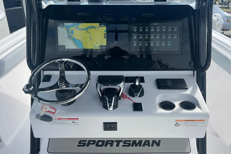 Slide: The Image of 2026 Sportsman Open 302 Center Console dashboard with steering wheel and navigation display. - 8