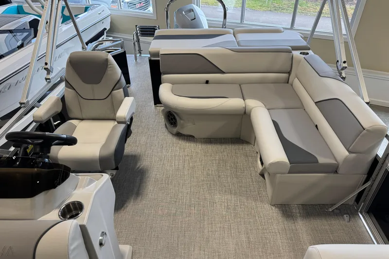 Slide: The Image of 2026 Avalon Venture 85 CR boat interior with plush seating and modern design. - 8