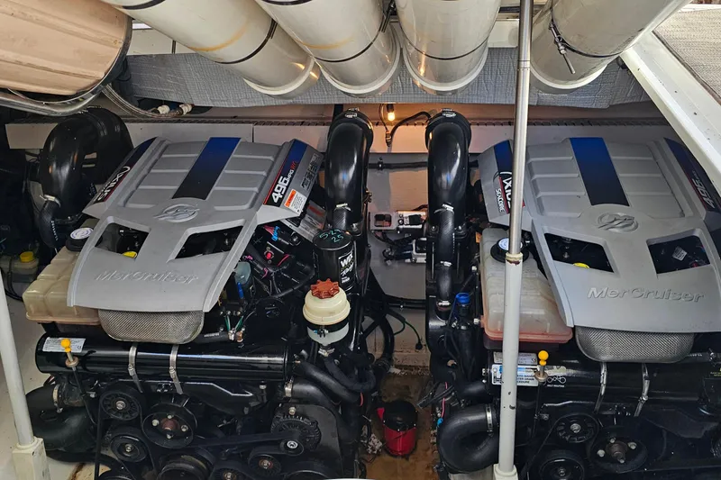 Slide: The Image of Twin MerCruiser engines in a 2009 Cobalt 373 boat engine compartment. - 53