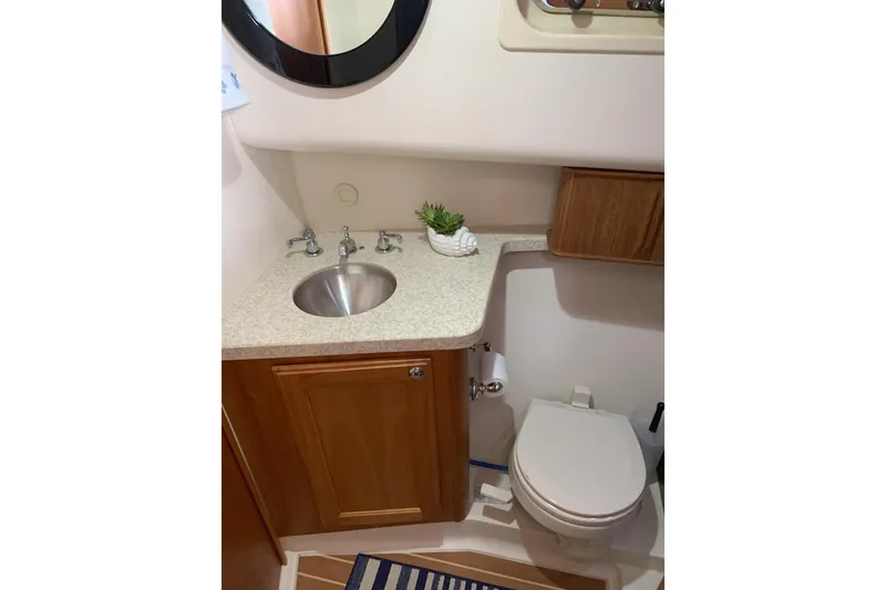 Slide: The Image of head with sink, toilet, and private access to the head - 38