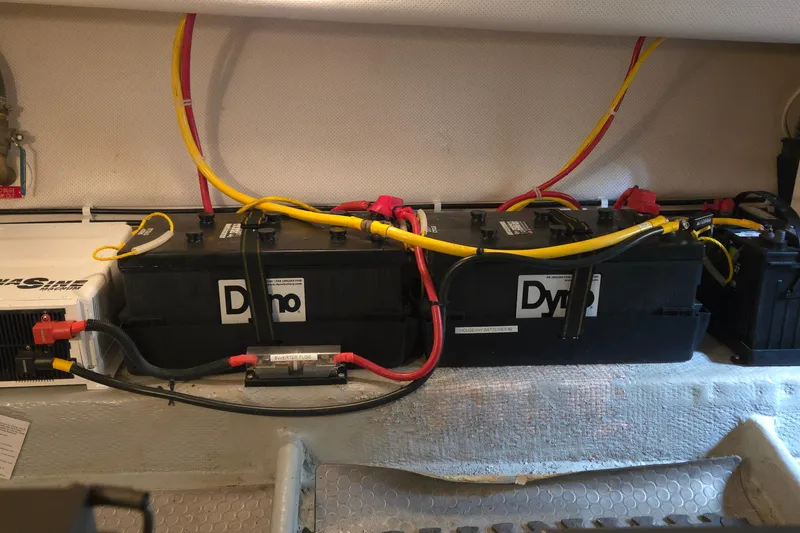 Slide: The Image of battery bank, two house batteries, one start battery - 61