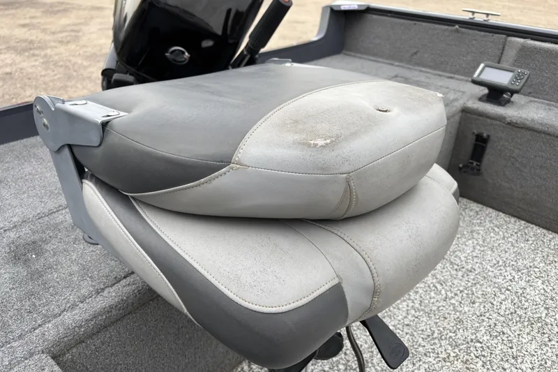Slide: The Image of 2015 Tracker Pro Guide V-16 T boat seat, showing wear and tear. - 8