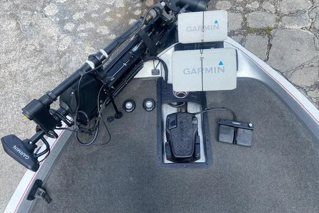 Slide: The Image of 2014 Ranger 520C boat deck with Garmin electronics and foot pedal controls. - 7