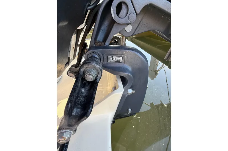 Slide: The Image of Close-up of a 2004 Parker 2510 Modified Vee Walkaround boat engine component. - 12