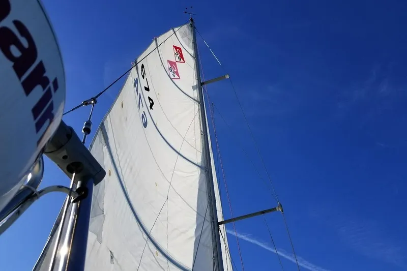 Slide: The Image of Sail of 2001 Catalina 28 MkII against clear blue sky. - 3