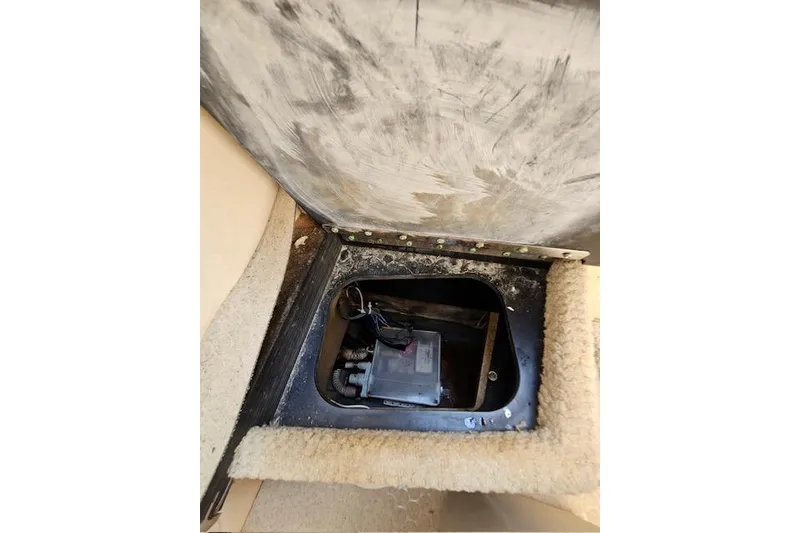 Slide: The Image of Access panel inside 2001 Sea Ray 260 Sundancer boat, showing internal components. - 15