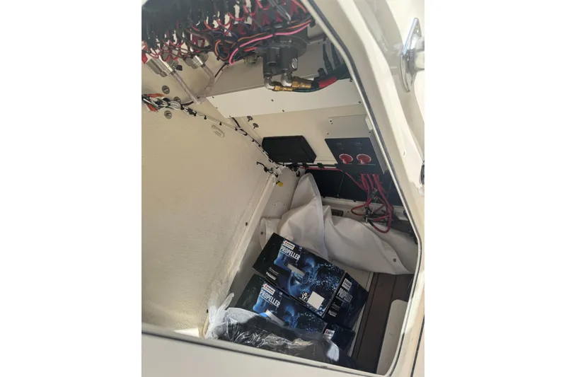 Slide: The Image of Interior view of 2026 Bulls Bay 255 boat showing wiring and propeller boxes. - 11
