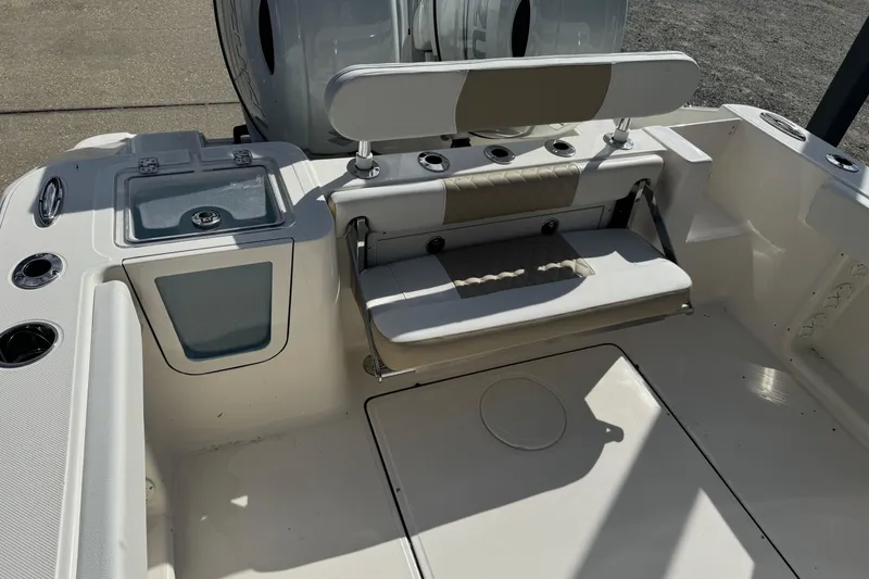Slide: The Image of 2026 Bulls Bay 255 boat interior with seating and storage compartments. - 5