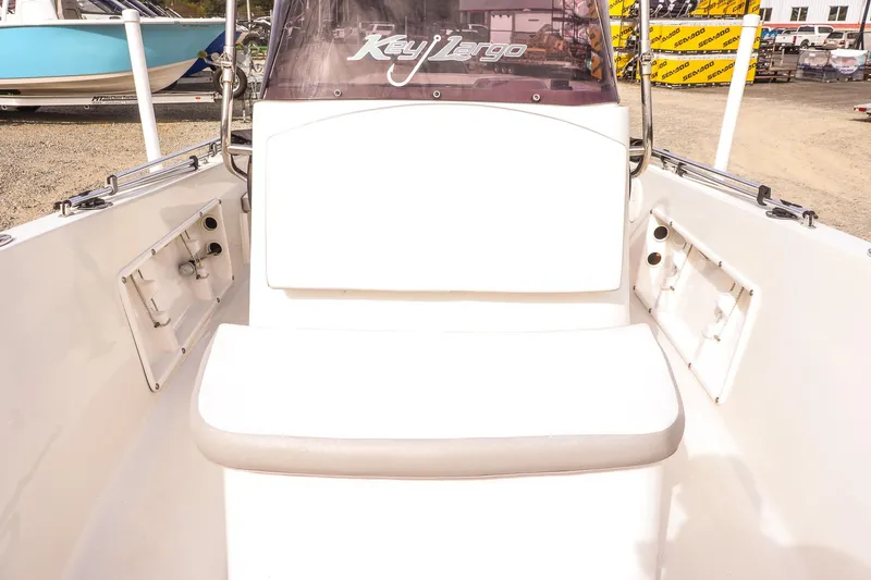 Slide: The Image of 2020 Key Largo 1800 Center Console boat interior with seating and storage compartments. - 15