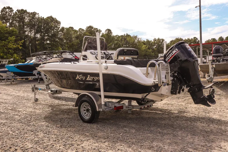 Slide: The Image of 2020 Key Largo 1800 Center Console boat with Suzuki outboard motor on trailer. - 4