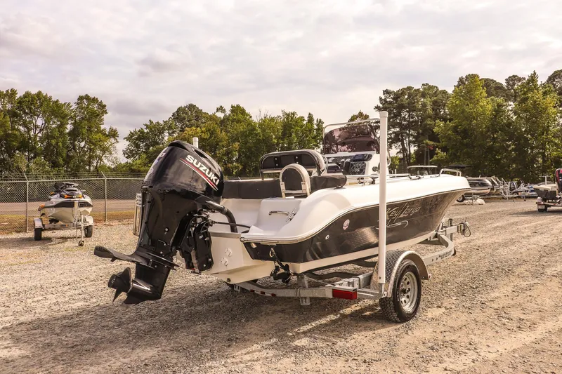 Slide: The Image of 2020 Key Largo 1800 Center Console boat with Suzuki outboard motor on trailer. - 6