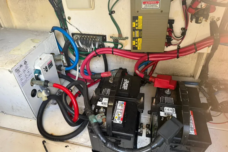 Slide: The Image of Electrical system of a 2006 Sea Ray 270 Amberjack boat with batteries and wiring. - 16