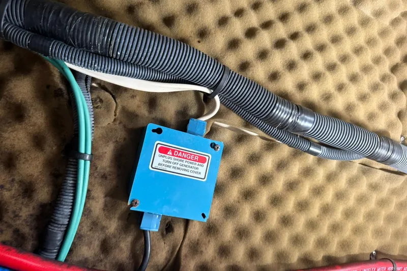 Slide: The Image of Electrical wiring and safety box inside 2006 Sea Ray 270 Amberjack boat. - 20