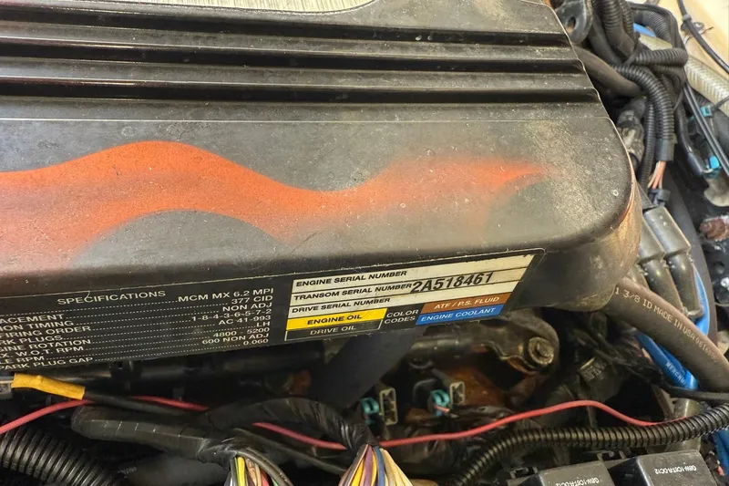 Slide: The Image of Engine compartment of 2006 Sea Ray 270 Amberjack with serial number details. - 47