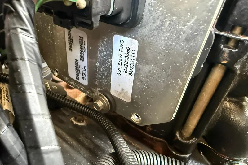 Slide: The Image of Engine component of 2006 Sea Ray 270 Amberjack boat, featuring labels and wiring. - 48