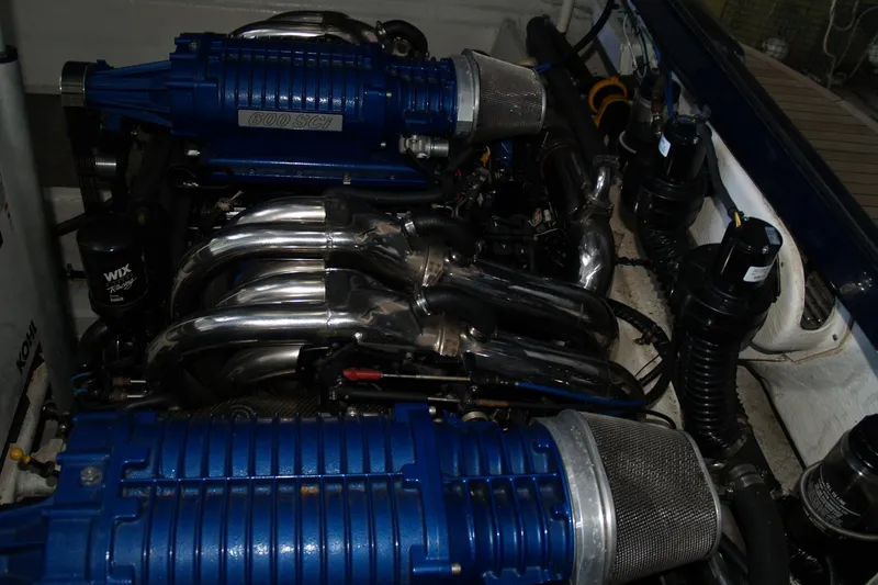 Slide: The Image of Engine compartment of a 2012 Hunton XRS 43 with blue 600 SCI components. - 10