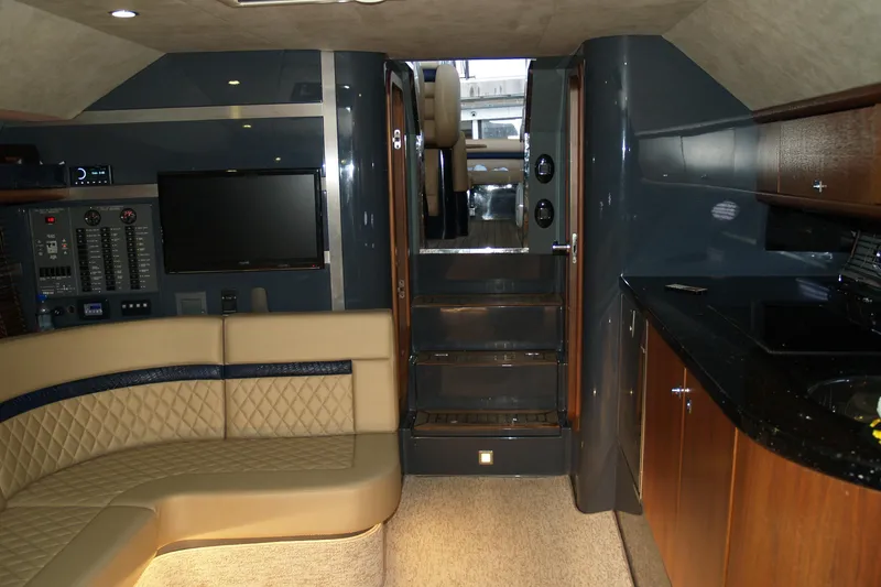 Slide: The Image of Luxurious interior of 2012 Hunton XRS 43 yacht with leather seating and modern amenities. - 4